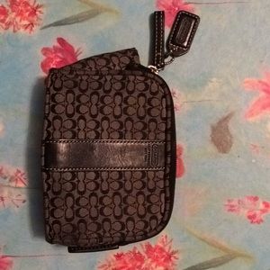 Black and grey COACH make up bag